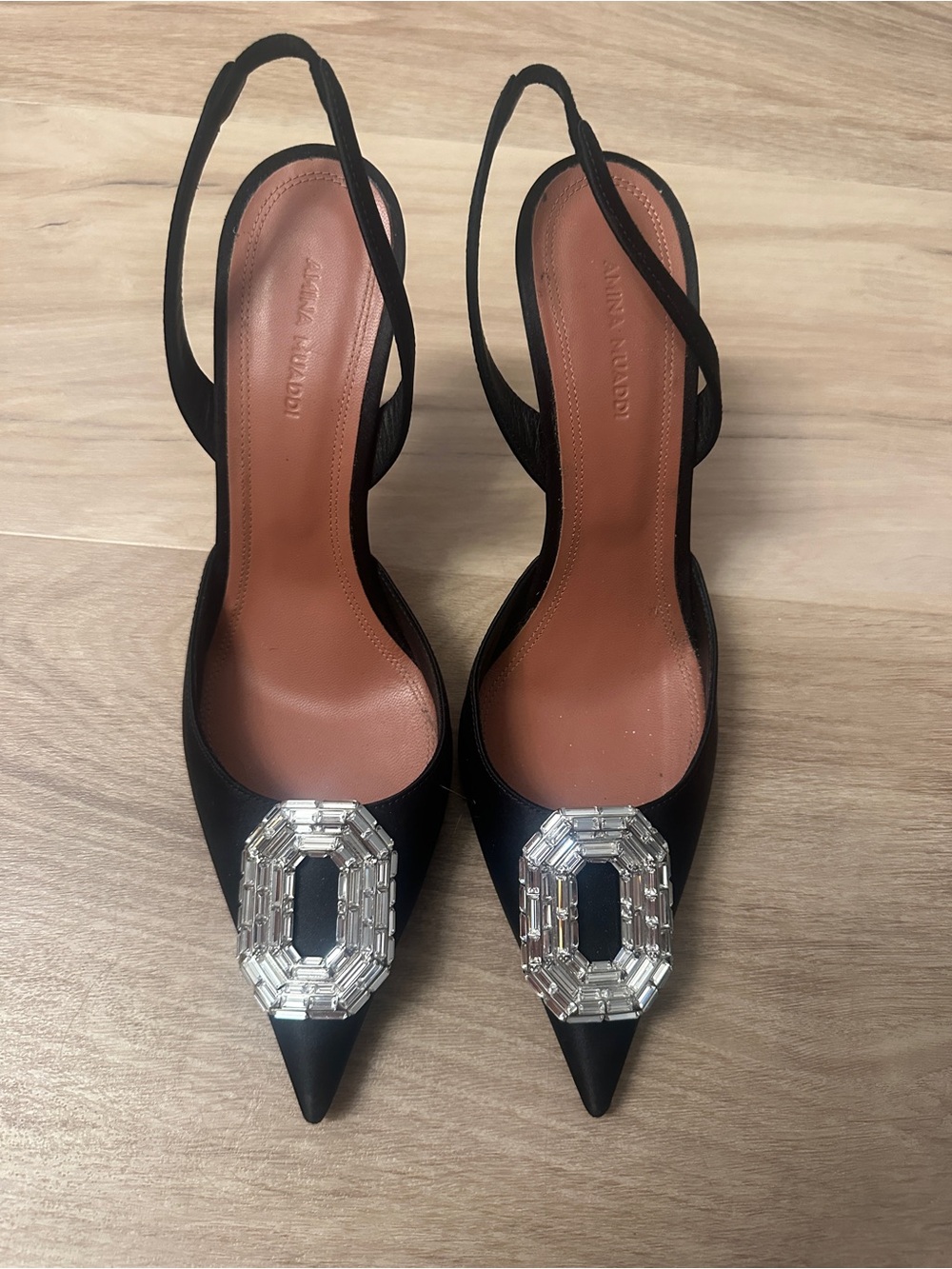 Amina Muaddi Black Pointed Slingback Heels with Crystal Buckle